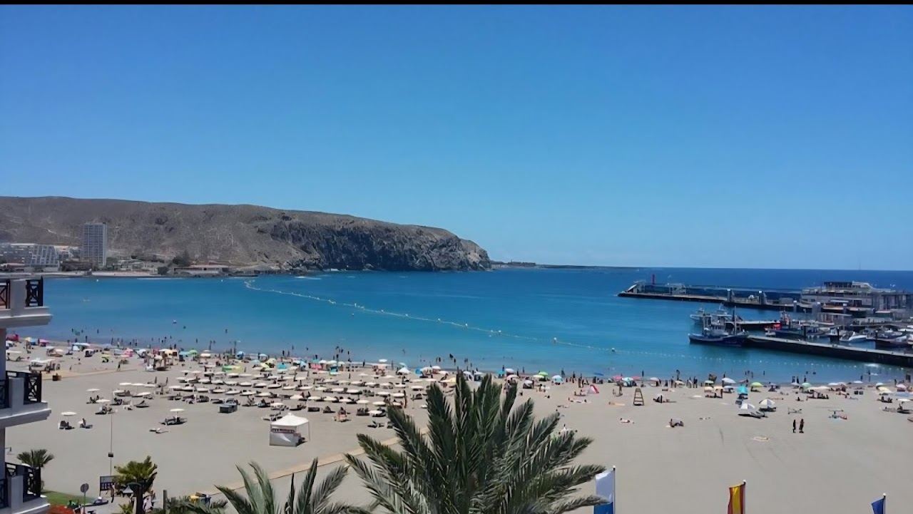 The sheltered town bay and calm sand of Los Cristianos in Tenerife