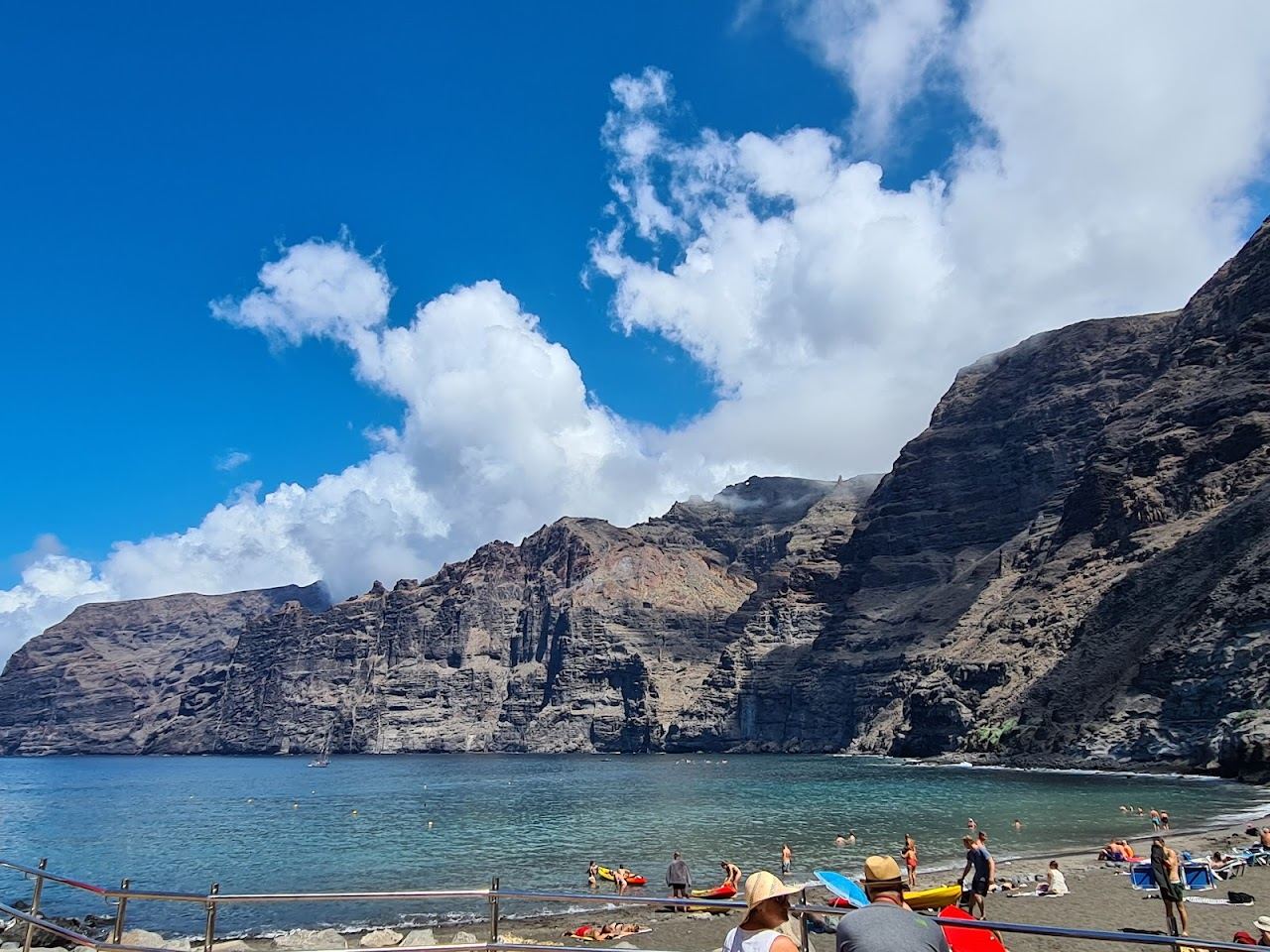 The black sand of Playa de los Guios beneath the cliffs of Los Gigantes, Tenerife