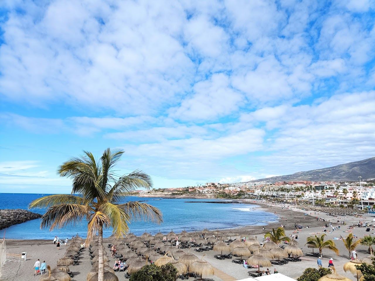 The golden sand and watersports of Playa de Torviscas in Costa Adeje, Tenerife