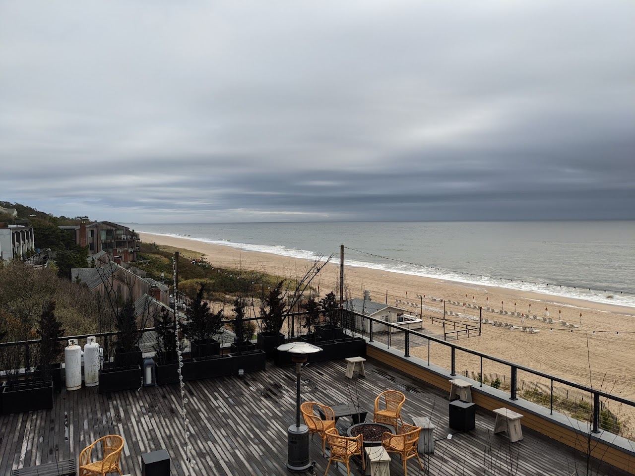 Daybeds and umbrellas on the private ocean beach at the Beach Club at Gurney's Montauk