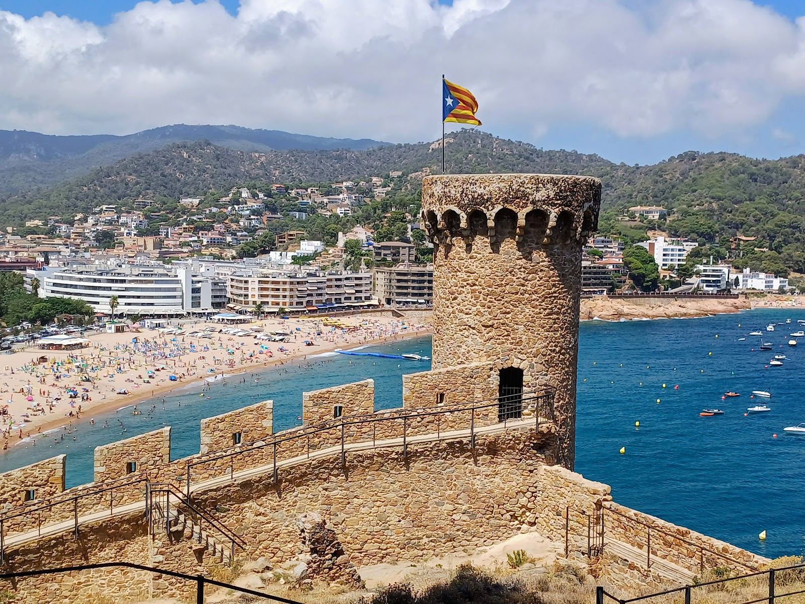 Stone walls and watchtowers of the Vila Vella old town above the beach at Tossa de Mar