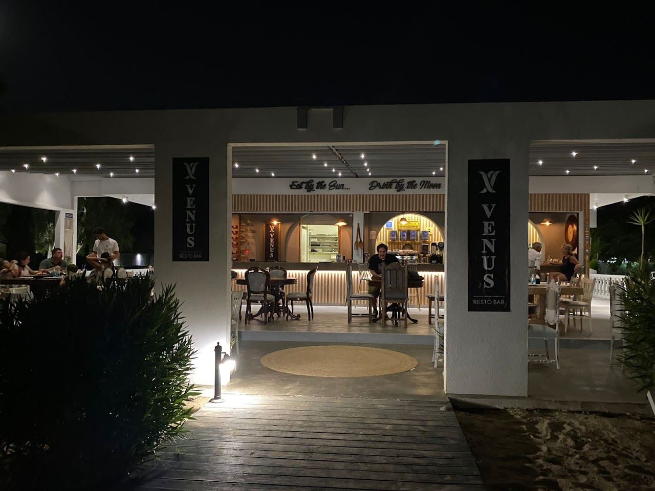 Sunbeds and a beach bar on the golden sand of the Tsilivi strip on the north coast of Zakynthos