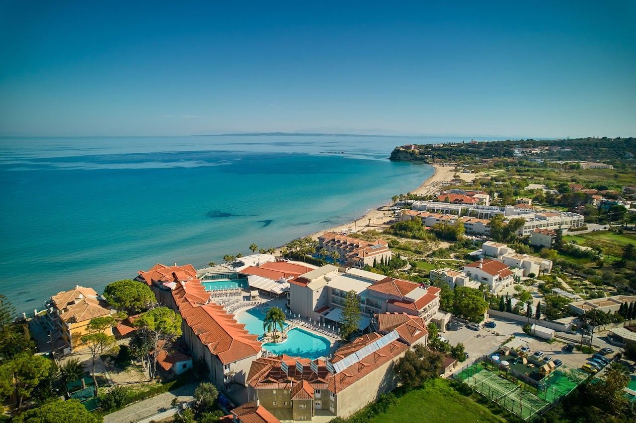 Soft sand, sunbeds and calm clear water along the Tsilivi strip on the north coast of Zakynthos