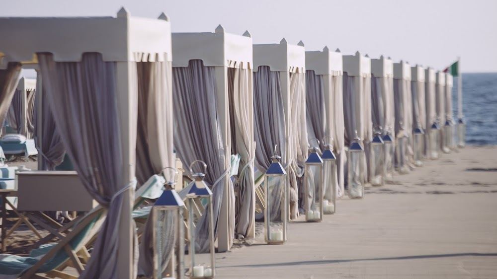 Private tents and umbrellas at Alpemare beach club in Forte dei Marmi
