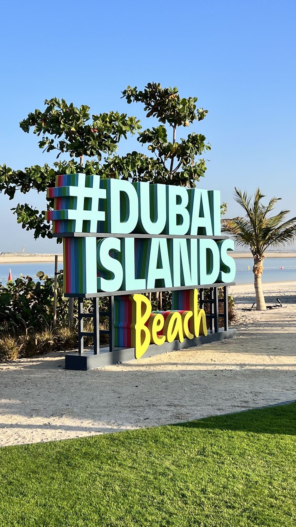 Clean new Blue Flag sand and calm water at Dubai Islands Beach off Deira, Dubai