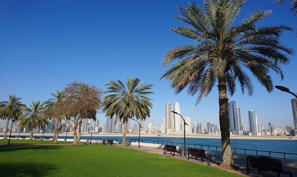 Sheltered lagoon beaches and green lawns inside the gated Al Mamzar Beach Park, Deira Dubai