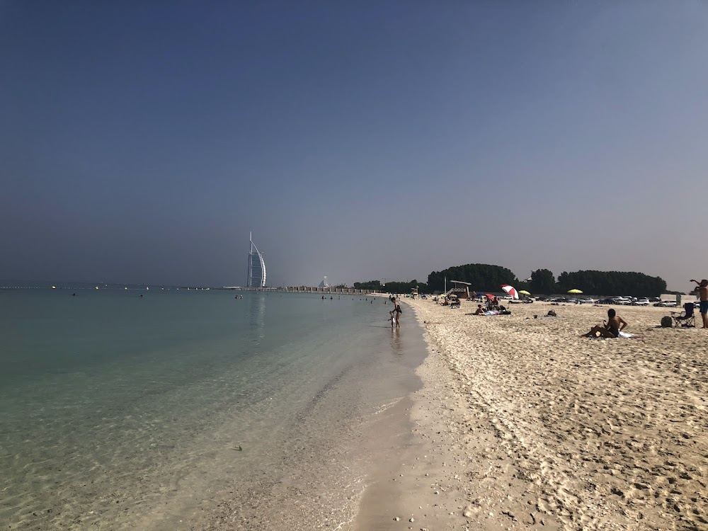 Free undeveloped sand at Black Palace Beach with the Burj Al Arab on the Dubai skyline