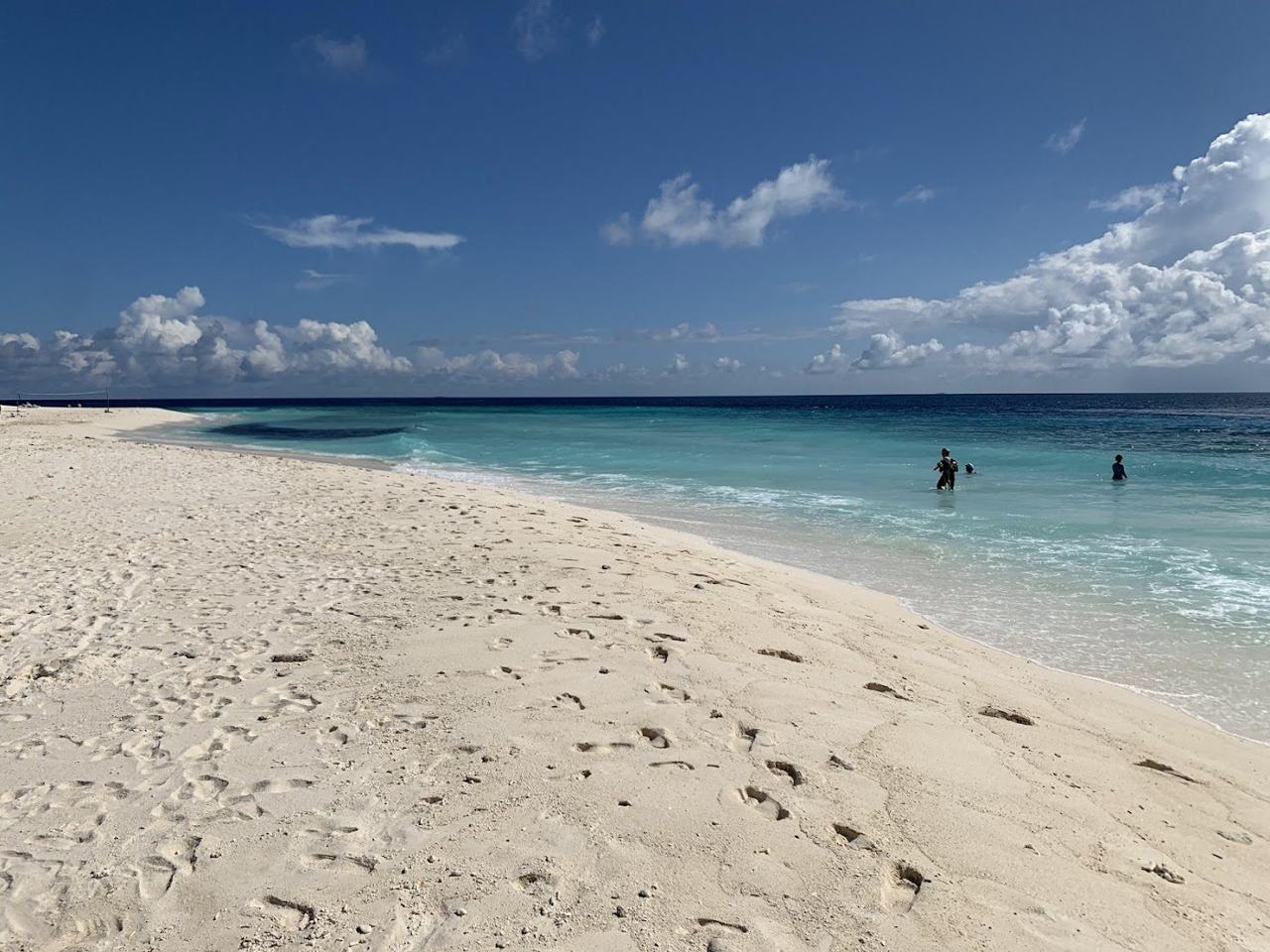 Ukulhas in the Maldives, a clean white beach beside a clear reef lagoon