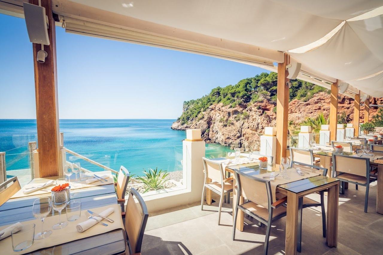 Cliffside terrace above Sol d'en Serra cove at Amante Ibiza