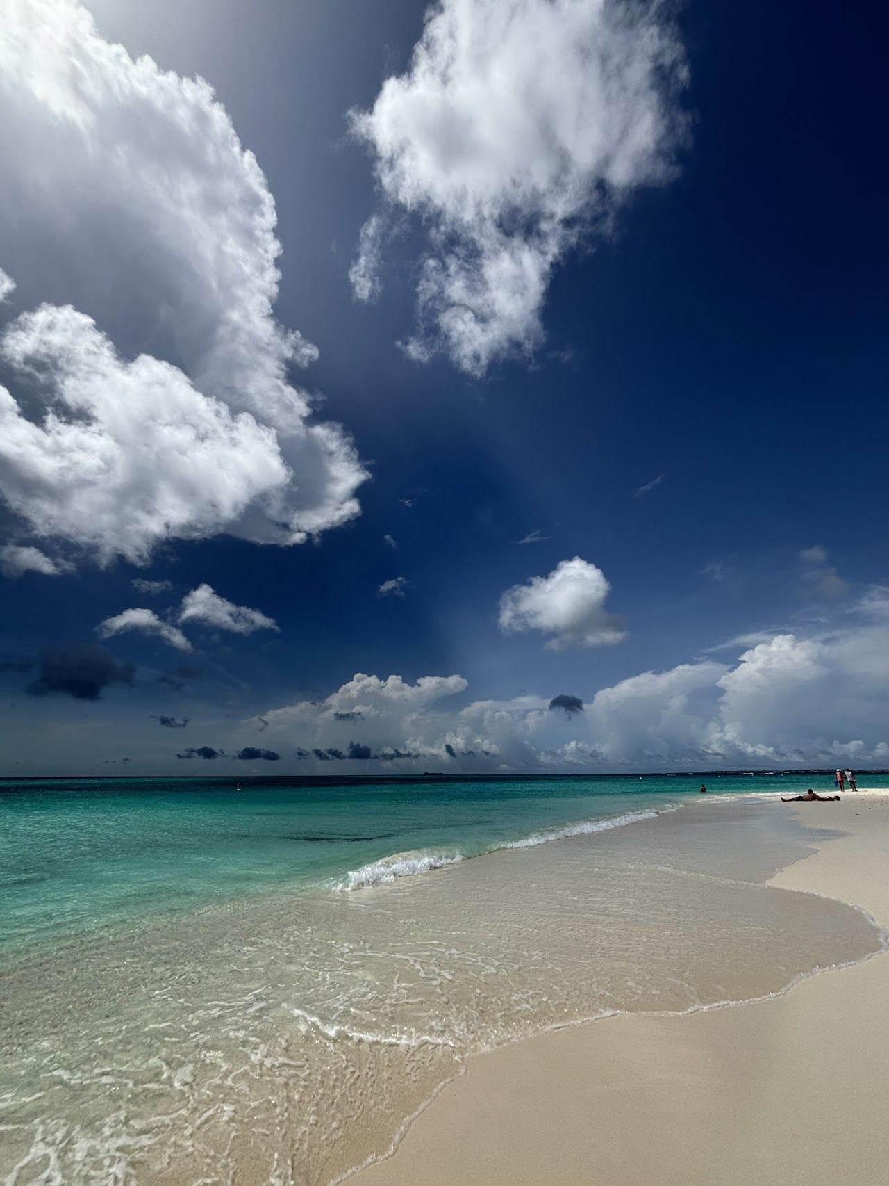 Wide, soft and brilliant white, one of the broadest and quietest of the great Caribbean sands.