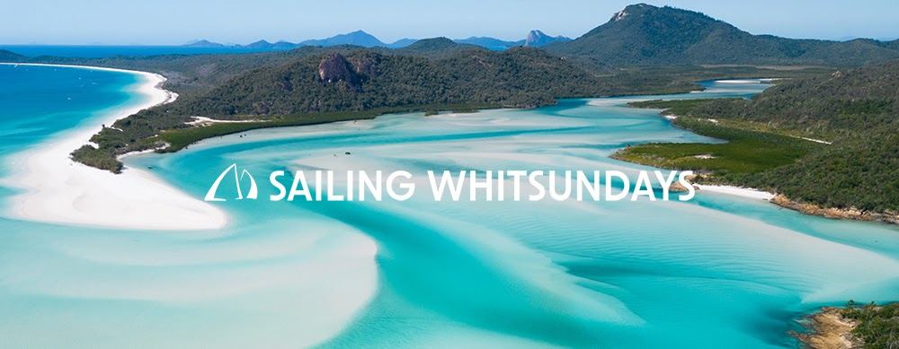 Sailing yachts and clear water in the Whitsunday Passage off Airlie Beach in the Whitsundays