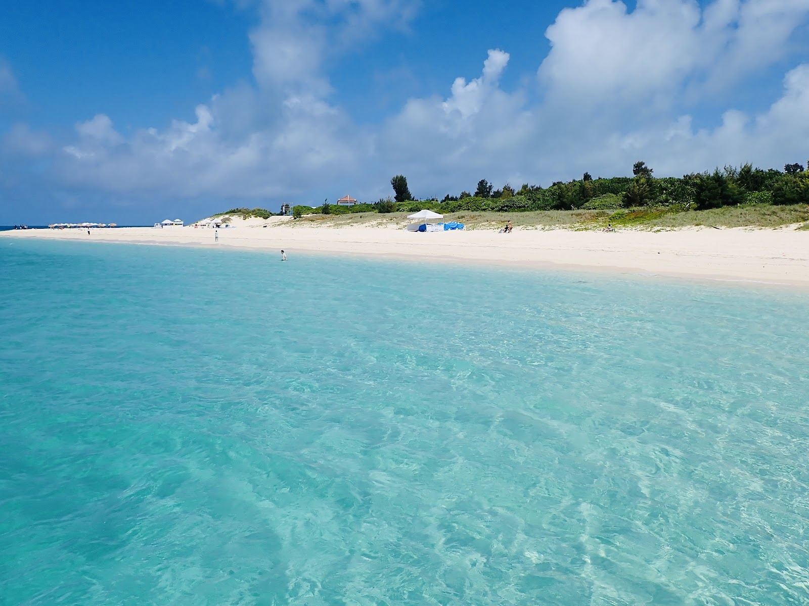 The wide white sand bar and shallow water of Yonaha Maehama Beach on Miyako, Okinawa
