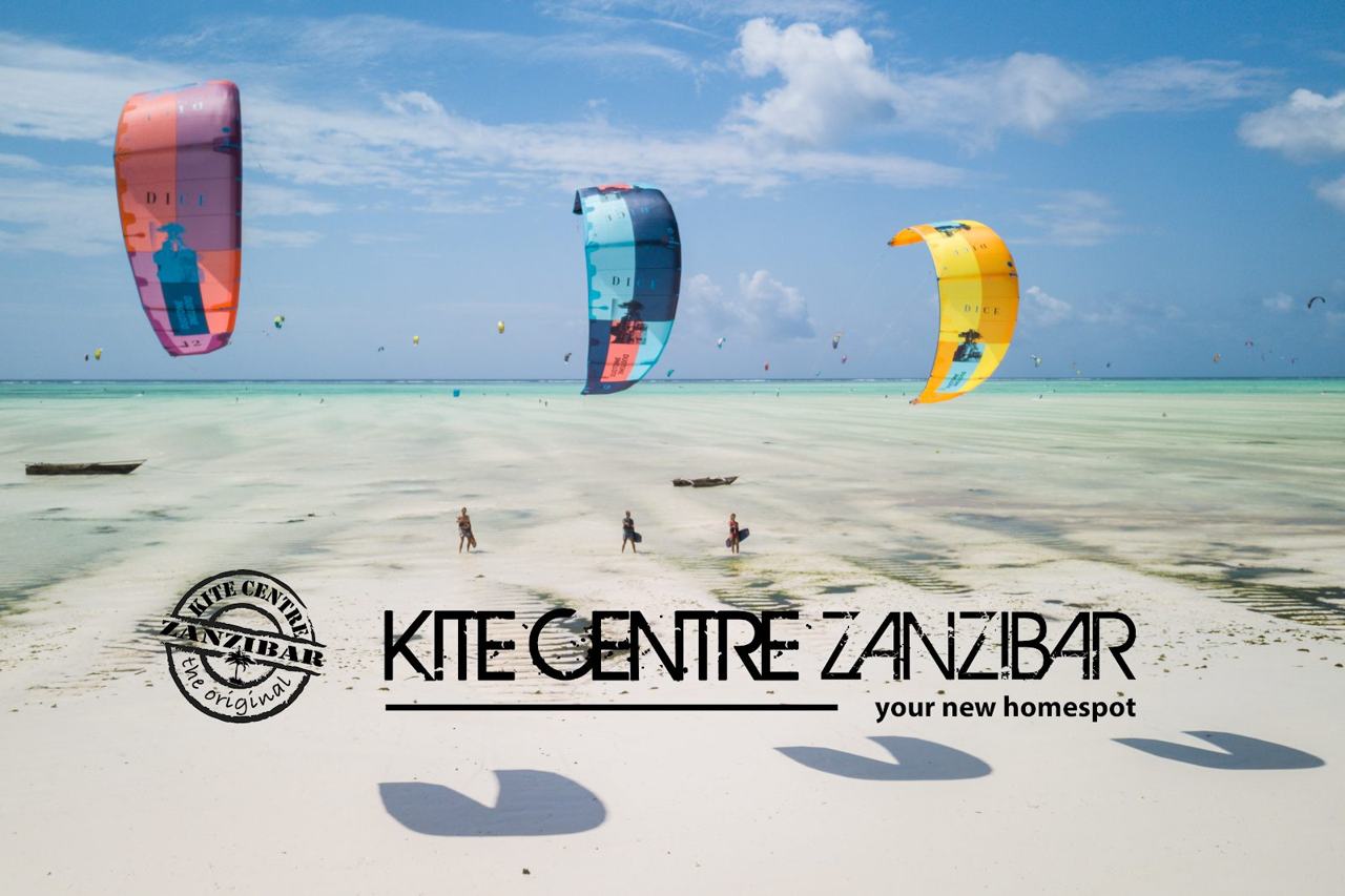 Kitesurfers on the flat shallow lagoon at Paje beach on the east coast of Zanzibar